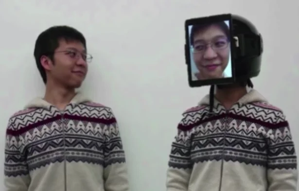 Send a ‘surrogate’ to meetings wearing an iPad with YOUR face on it