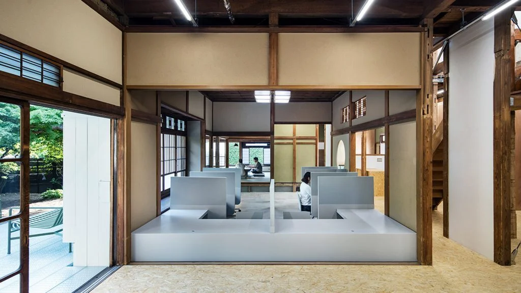 Schemata Architects contrasts original features with modern interventions for Japanese office