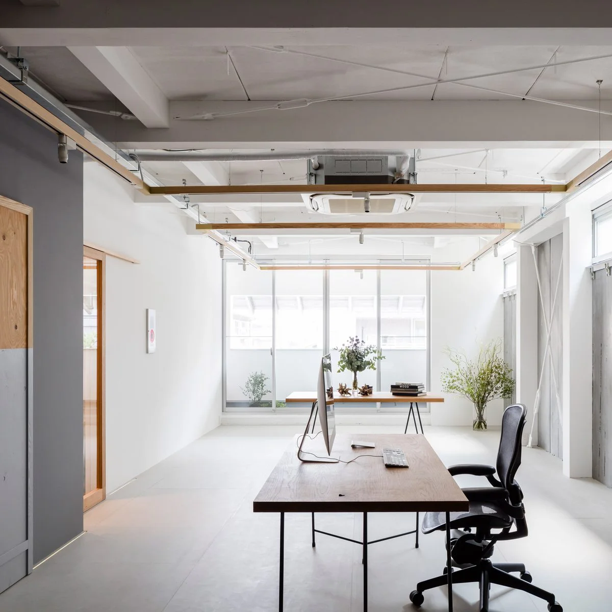 Shimpei Oda and Tetsuya Tanji keep things minimal in studio for graphic design office Panda