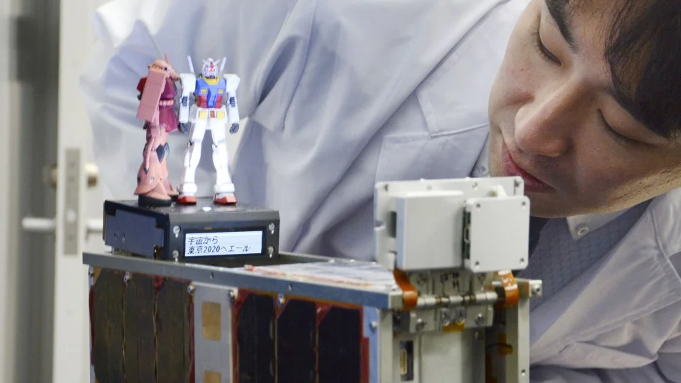 Tokyo Olympic committee shows replica of "Gundam" promotion satellite