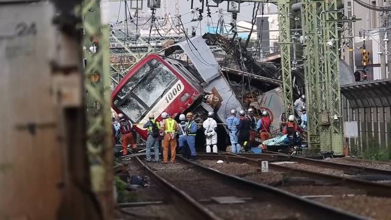 Truck and train collision in Japan kills one, injures at least 34