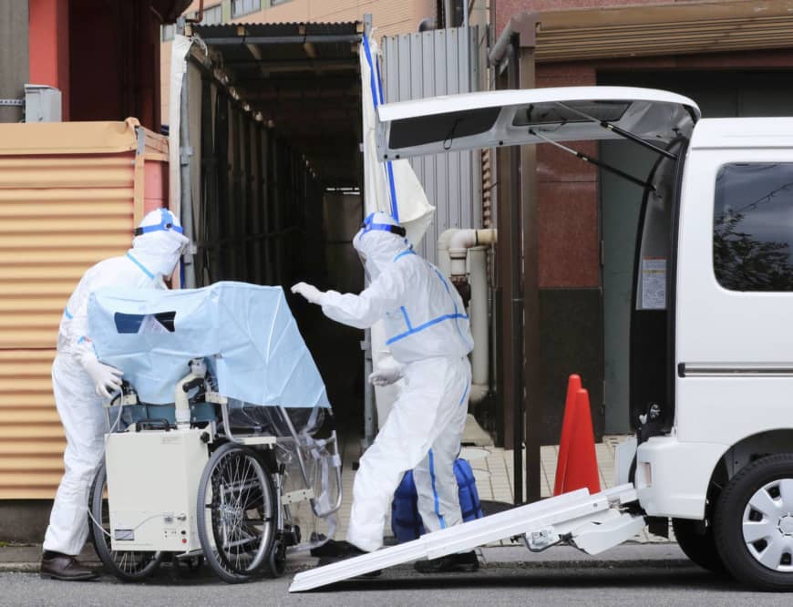 Children of nurses in Japan excluded from day care over virus fears